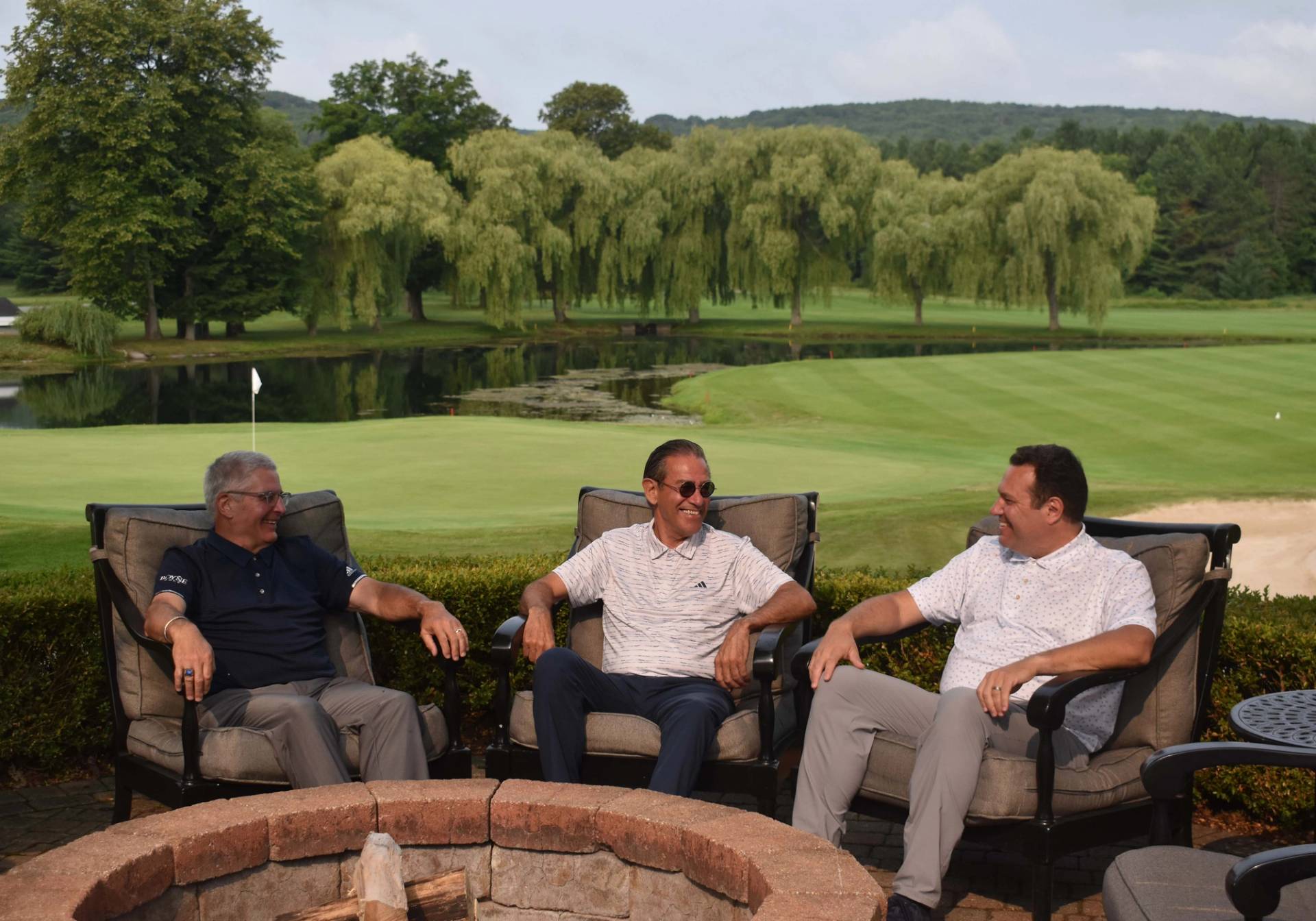 guys on ross patio at fireplace