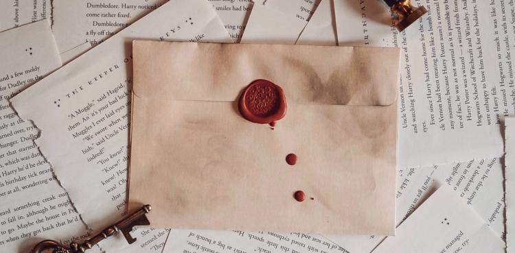 an antique red wax seal on an old envelope