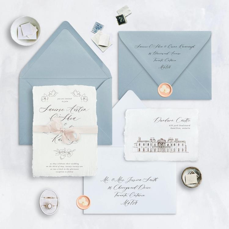 Wedding invitation suite with blue envelopes