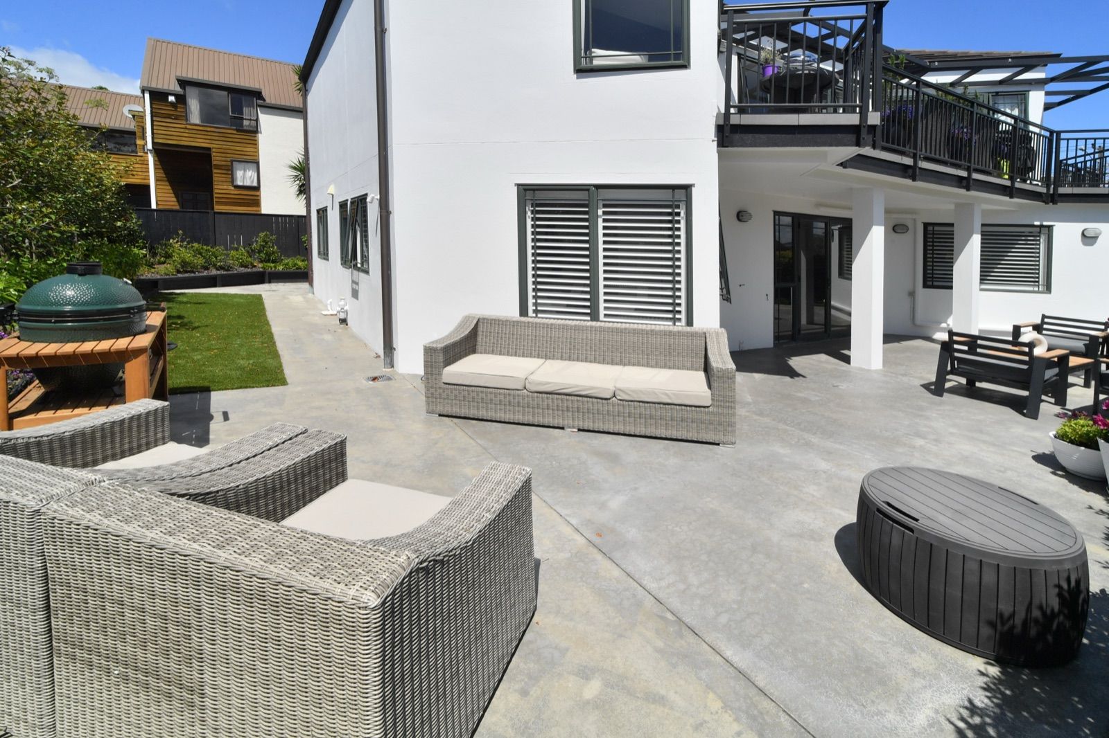 Concrete patio and landscaping
