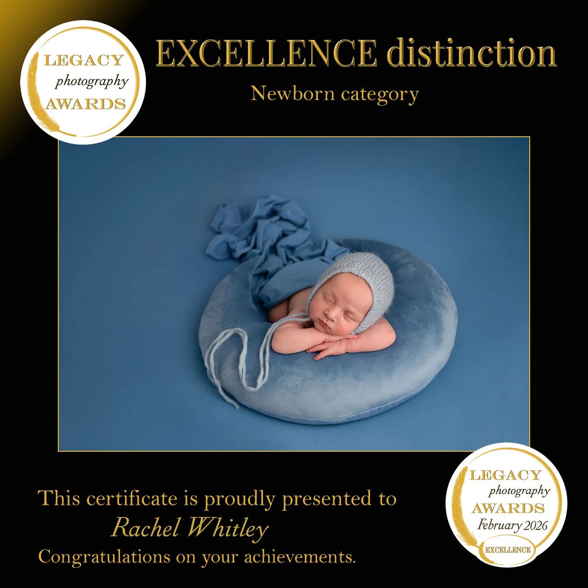Legacy Photography Awards Excellence distinction, newborn category, February 2026 — sleeping baby in blue, photographed by Rachel Whitley