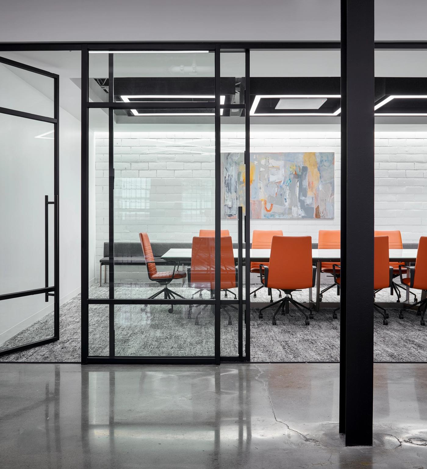 Glass-walled conference room at Nulite Lighting