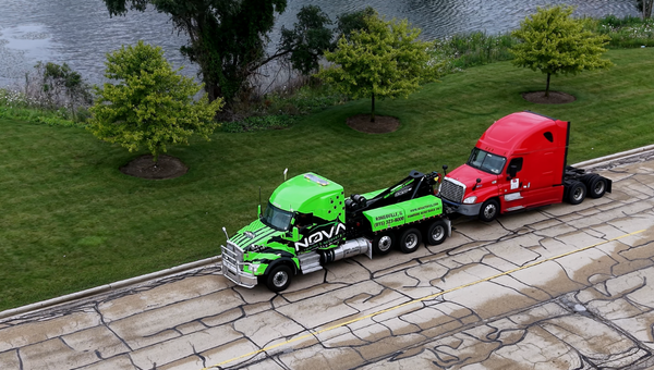 Nova Towing & Recovery heavy-duty tow truck equipped for commercial vehicle towing