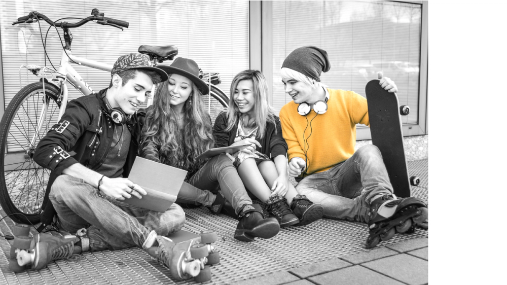 Teenagers watching a laptop Teenagers watching a laptop