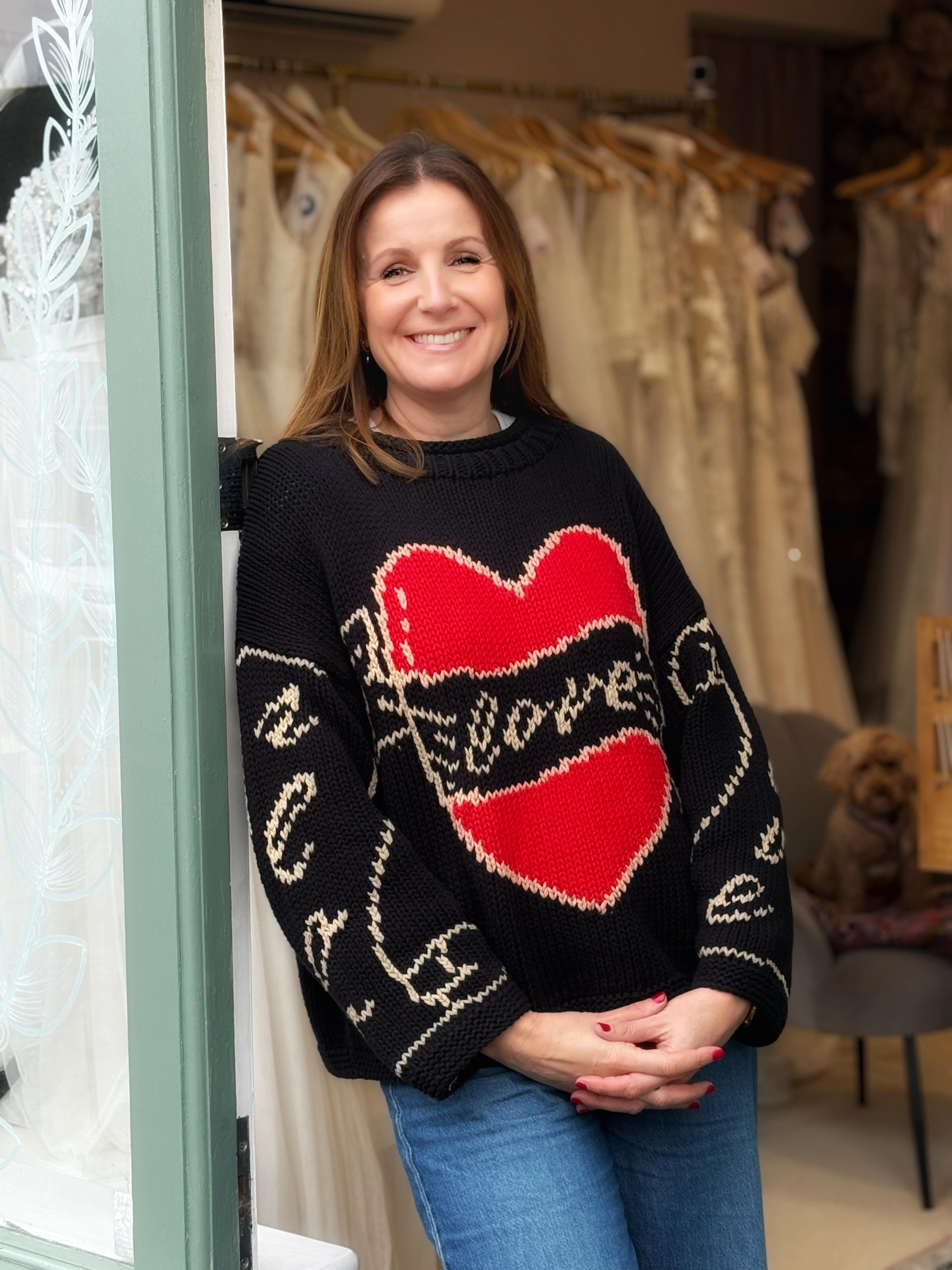 Debbie at the boutique door