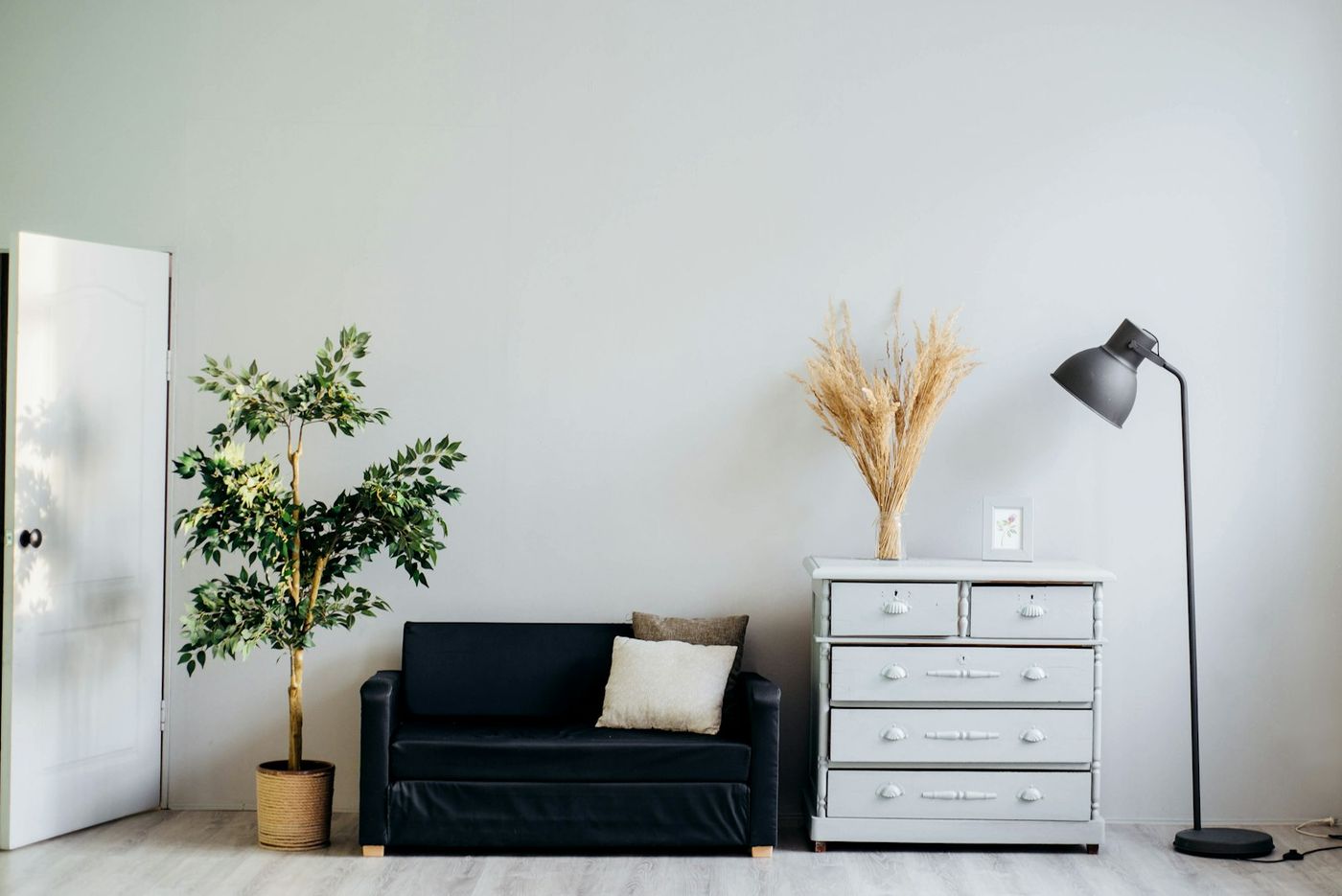 Quiet, calm sunlit room with wood desk and warm morning light