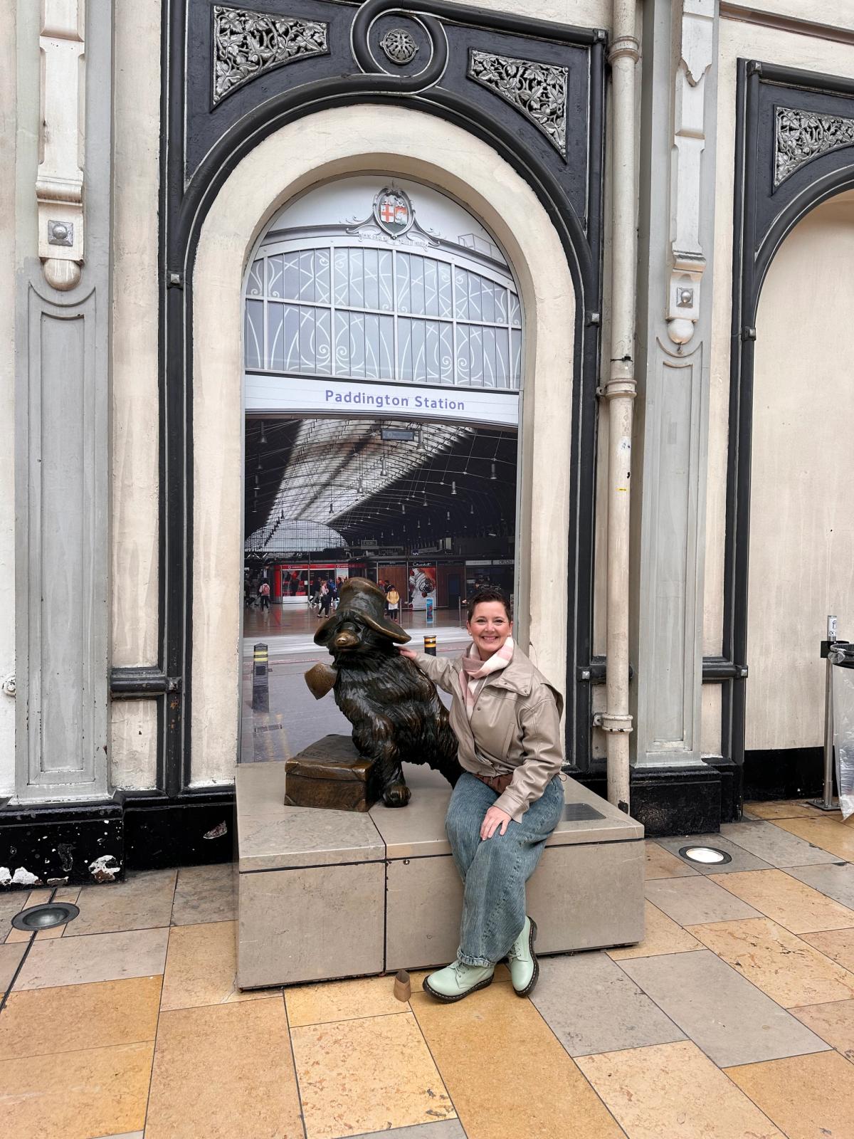 Ms. C with Paddington at his station