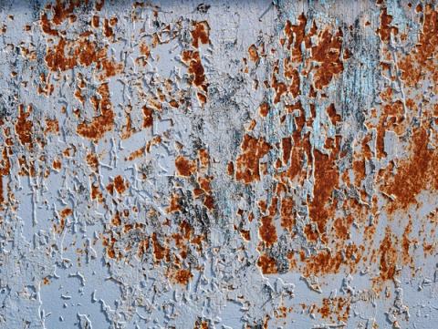 A textured ceiling coating of the kind that may contain asbestos in older homes