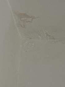 Water staining to lounge ceiling