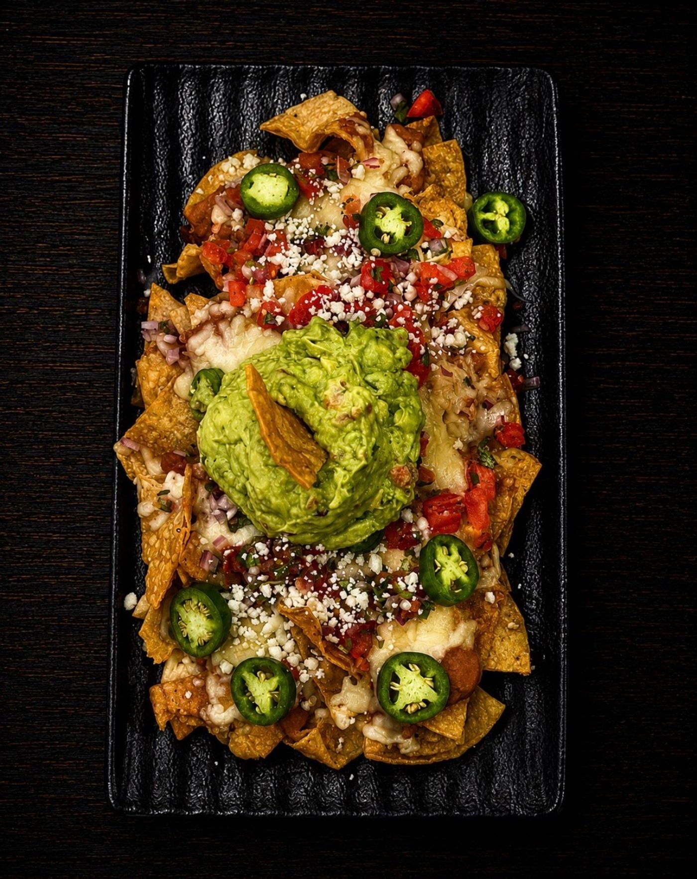 Baked nachos loaded with toppings