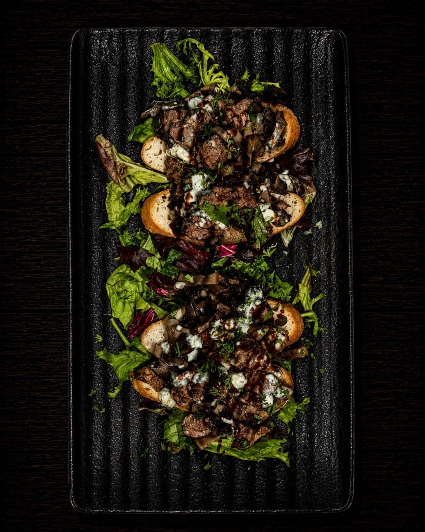 Steak crostini with bleu cheese and balsamic glaze