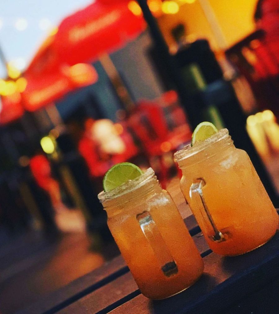 Mason jar cocktails on the patio at twilight