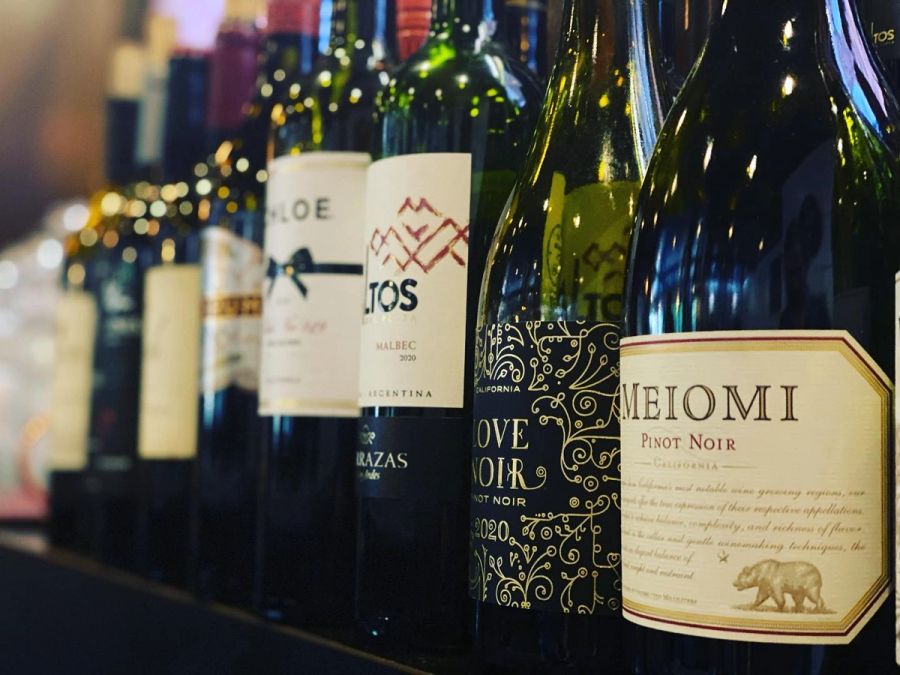 Row of wine bottles along the bar