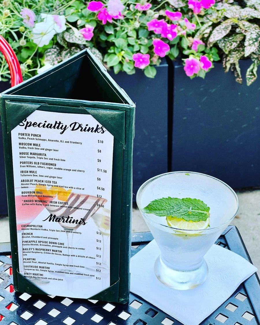 Martini beside the specialty drinks menu