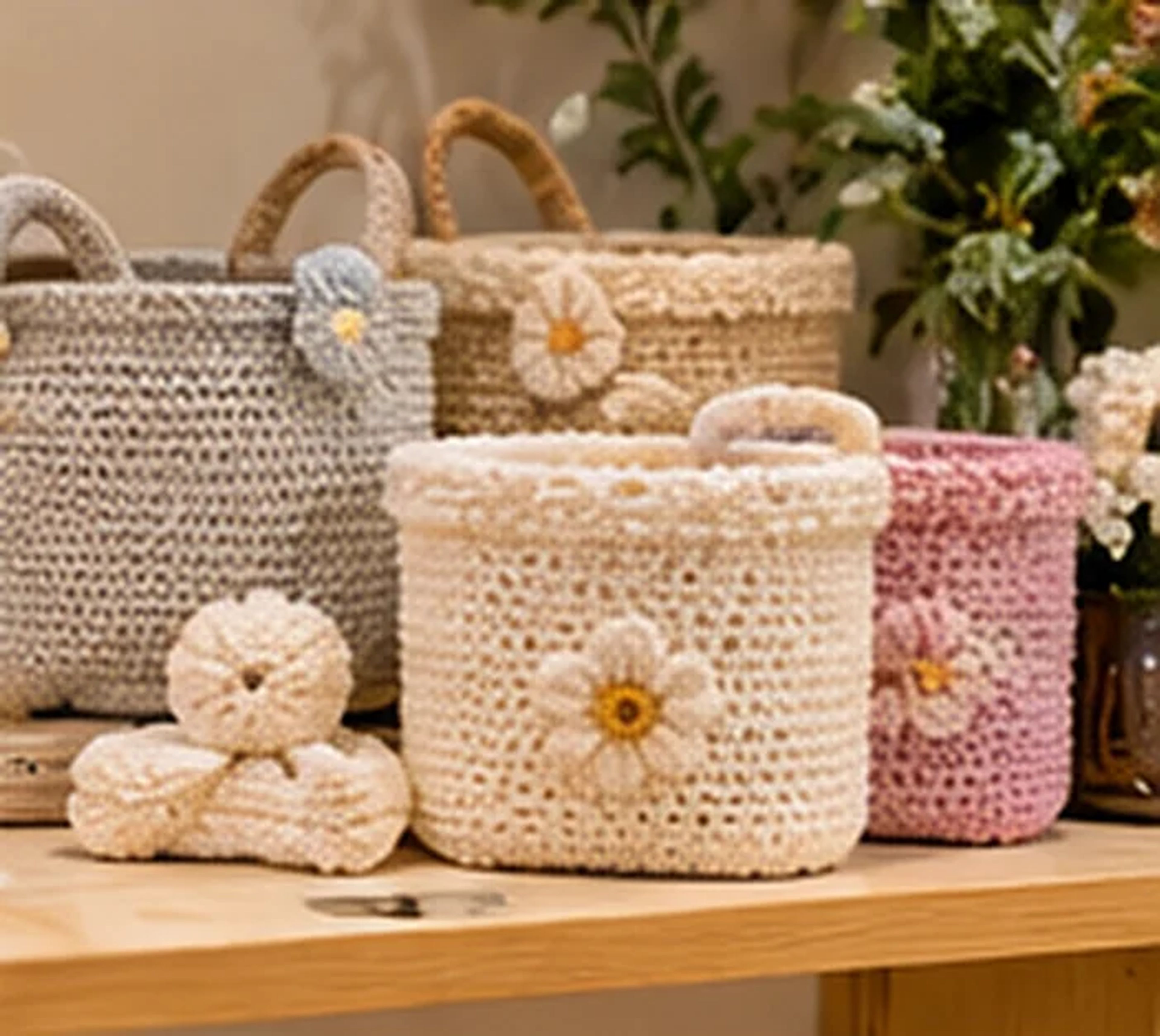 Crochet storage baskets with daisy details