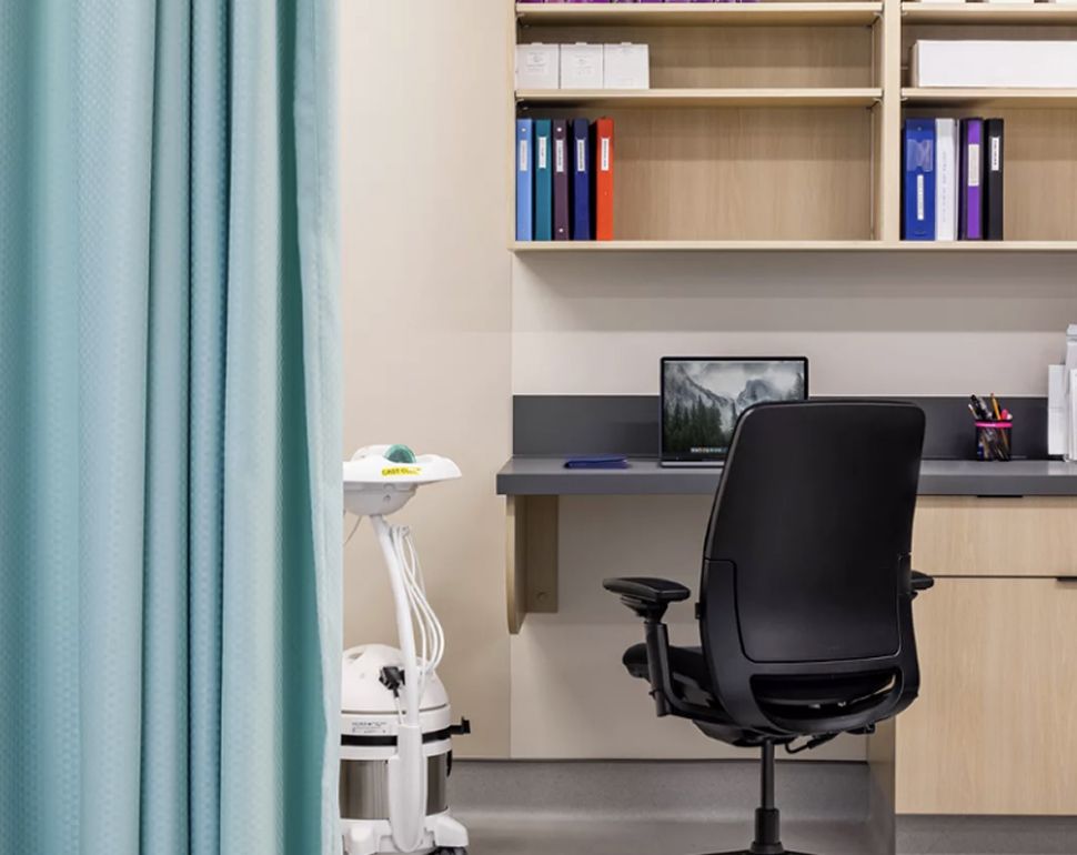 A renovated medical treatment room and office.