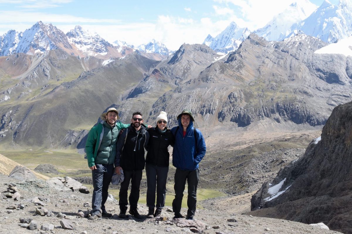 A group photo at the top of a valley