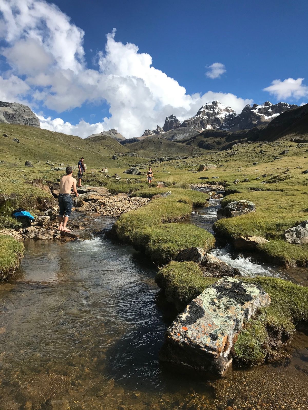 Bathing in the mountains in a grassy valley
