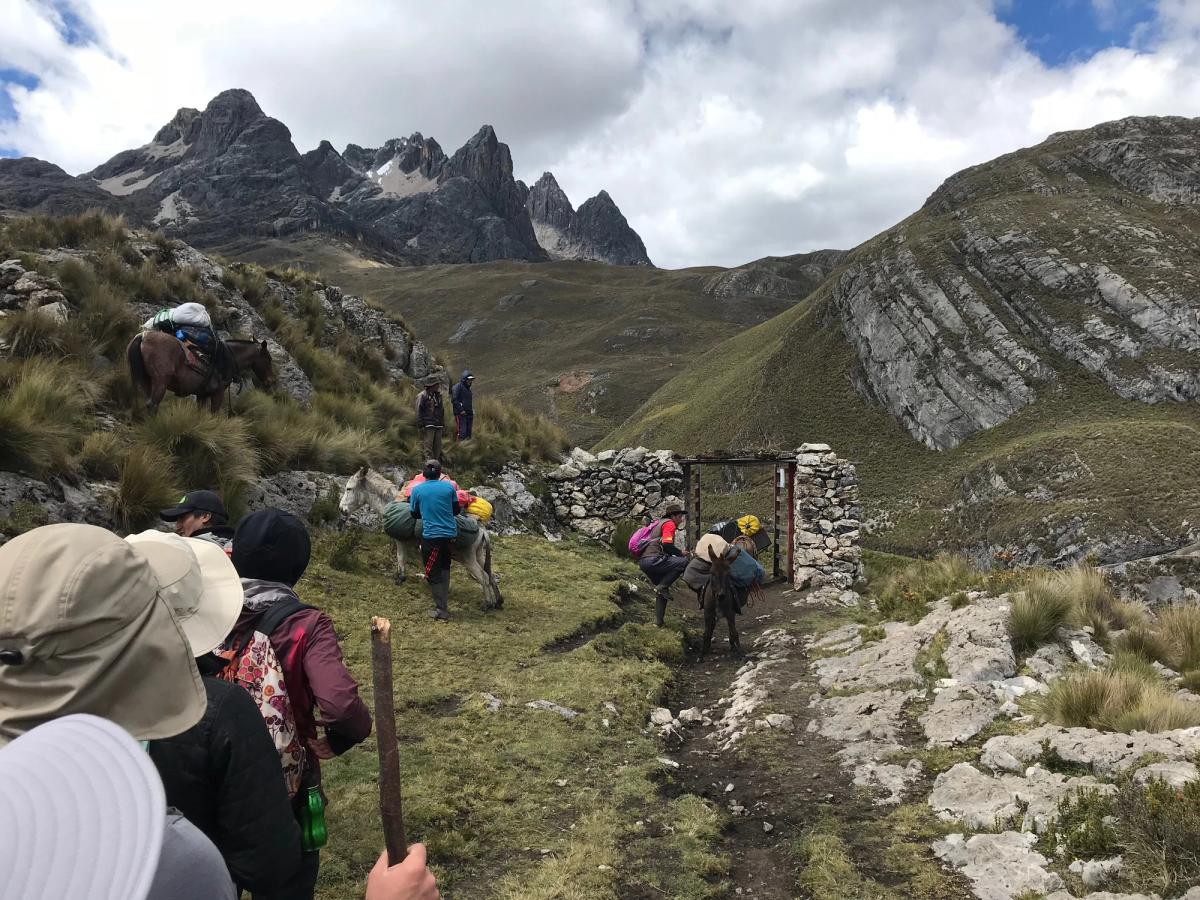Passing through a rock gate with donkeys in the lead