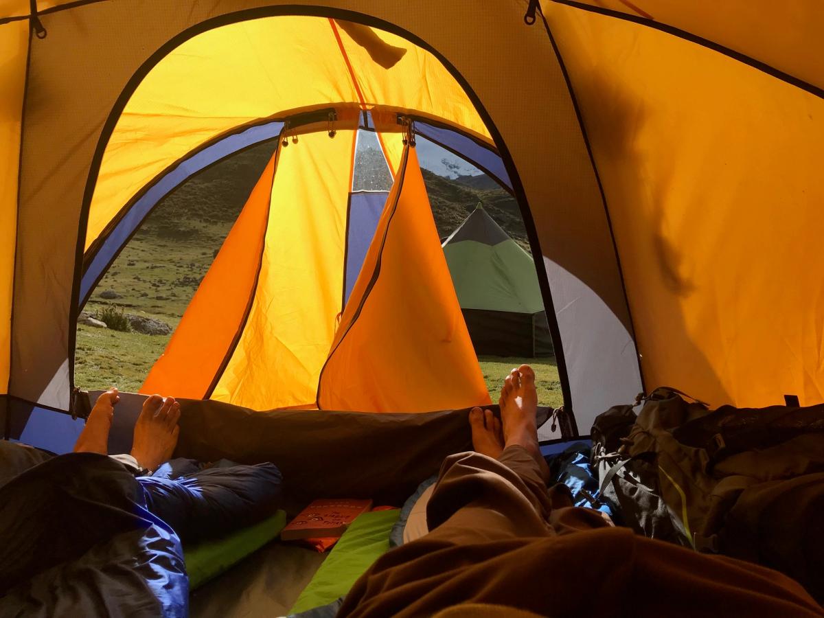 View from the inside of an orange tent