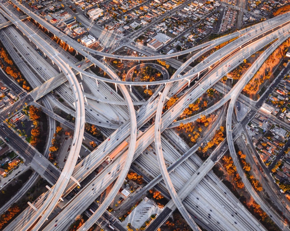 Aerial view of a sprawling highway interchange with looping overpasses
