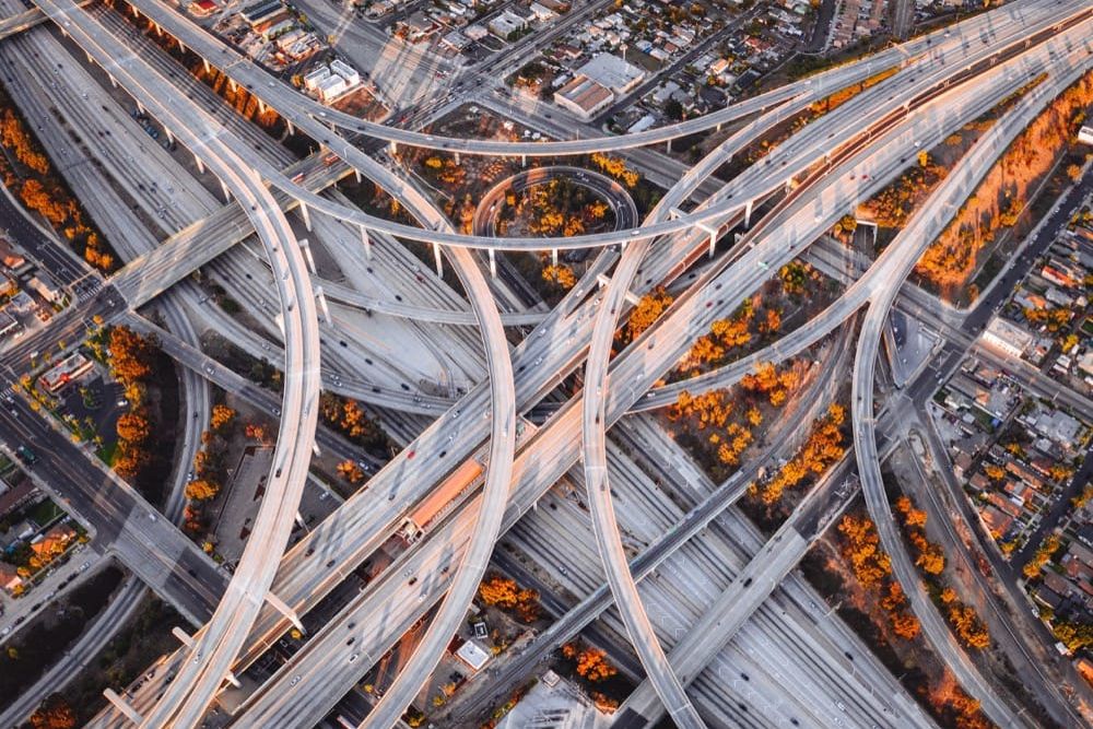 Aerial view of a sprawling highway interchange with looping overpasses