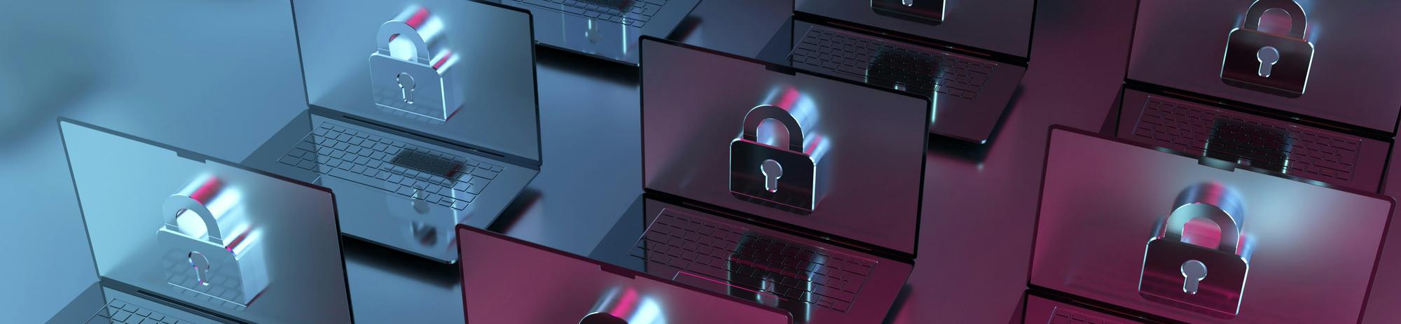 Row of laptops displaying glowing padlock icons, representing cybersecurity and compliance protection.