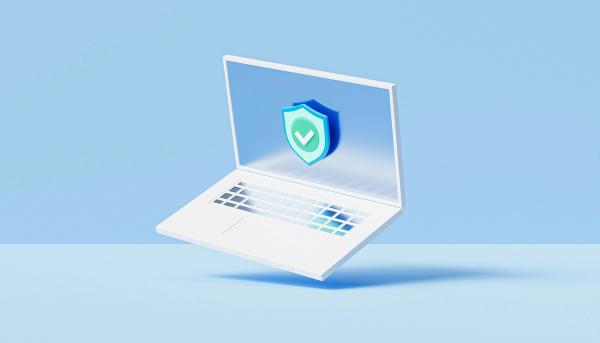 3D laptop with a security shield icon symbolizing cybersecurity, compliance, and safe digital operations.