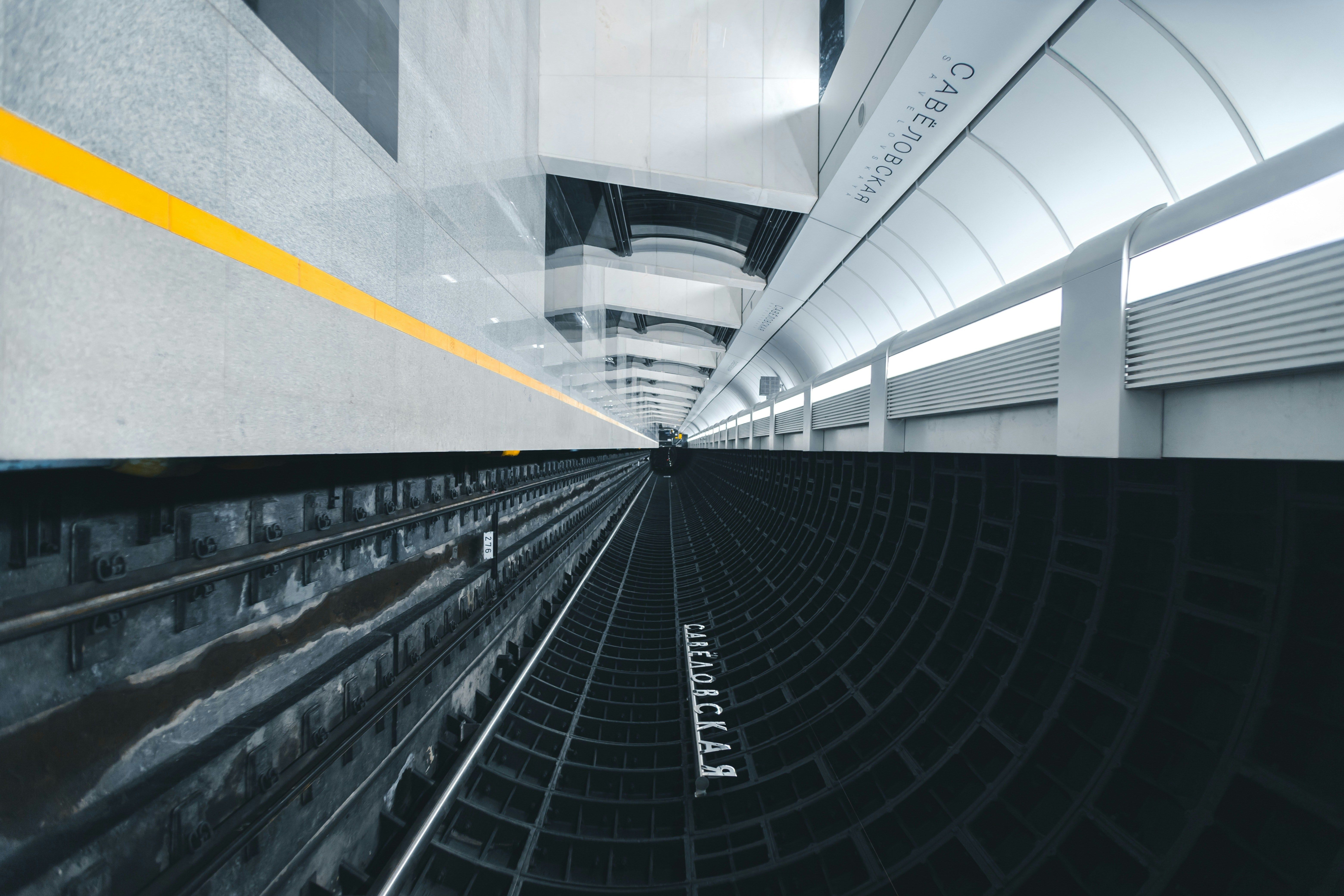 Futuristic tunnel with converging lines, symbolizing speed, connectivity, and streamlined integration.