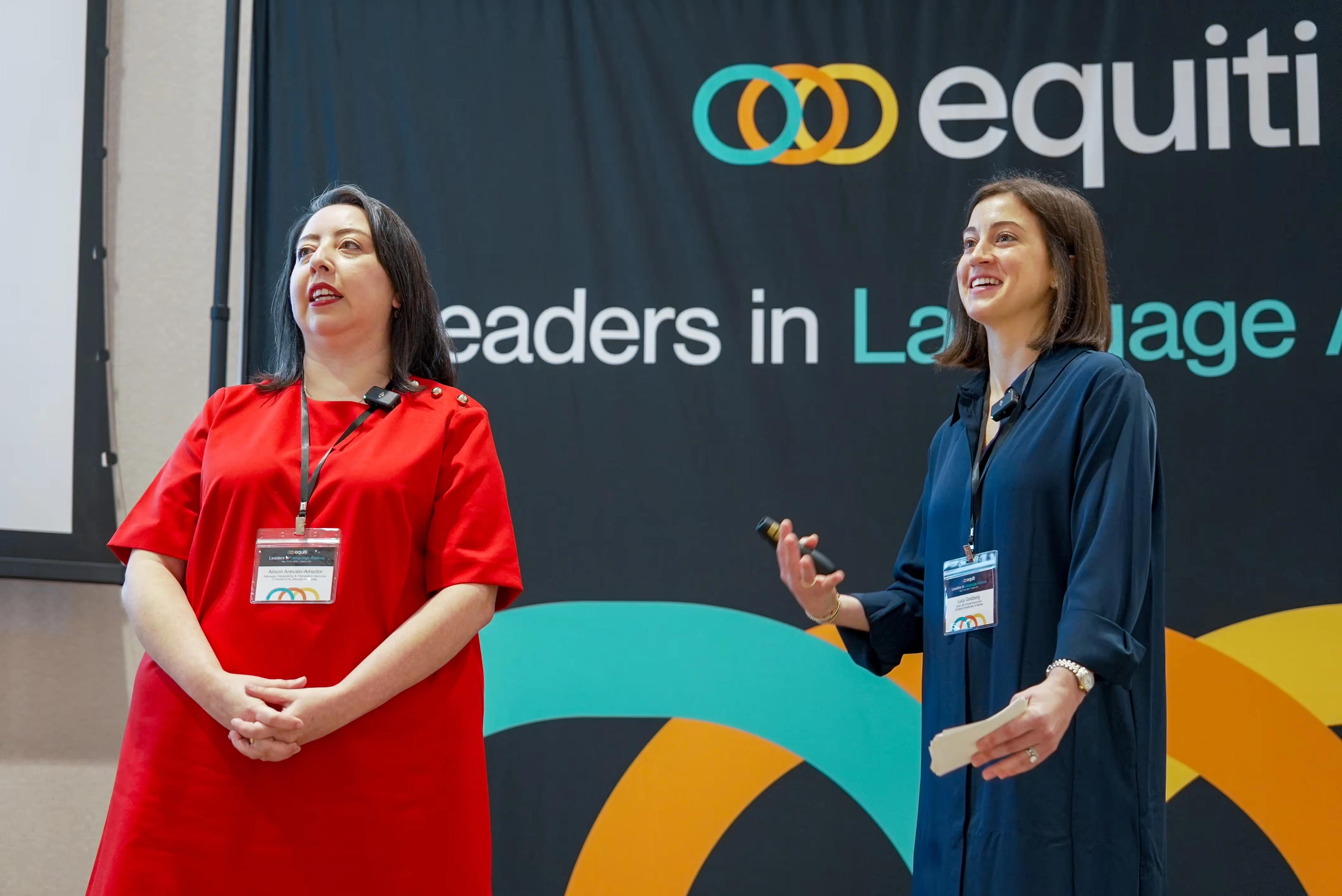 Two presenters on stage in front of an Equiti banner