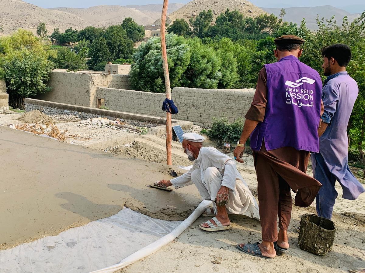 HRM aid worker helping to construct a home in Afghanistan | Human Relief Mission