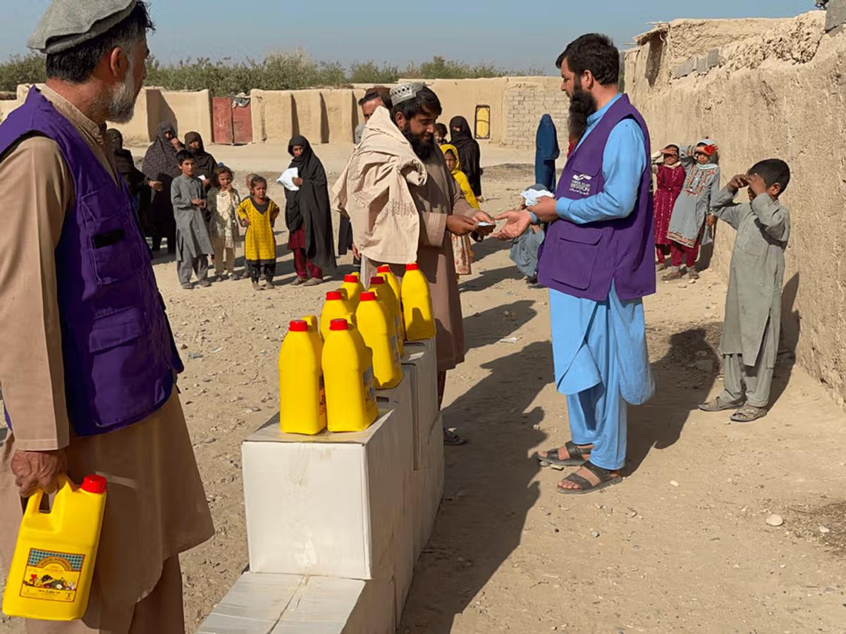 Beneficiaries in Afghanistan collecting their food packages | Human Relief Mission