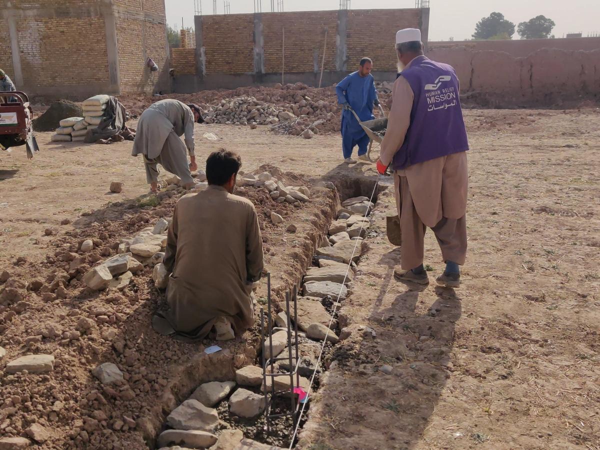HRM Charity Aid Worker helping to construct the bakery in Afghanistan | Human Relief Mission