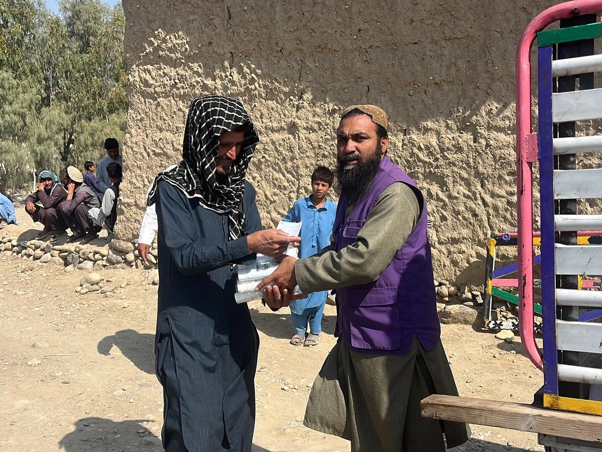 An Afghan local receiving a hygiene kit | Human Relief Mission