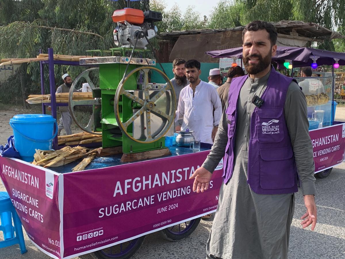 Man in Afghanistan with his Sugarcane Cart with Human Relief Mission Aid Worker | Human Relief Mission