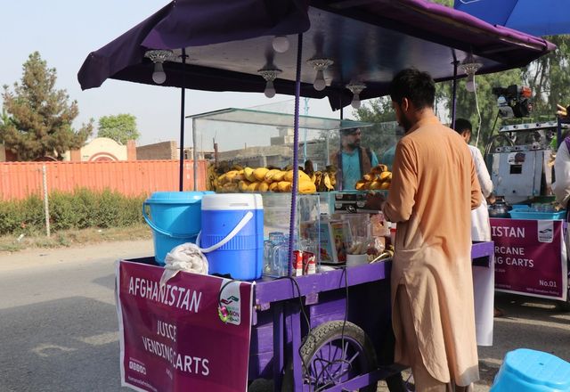 Afghan man with his fresh juice cart in Afghanistan | Human Relief Mission