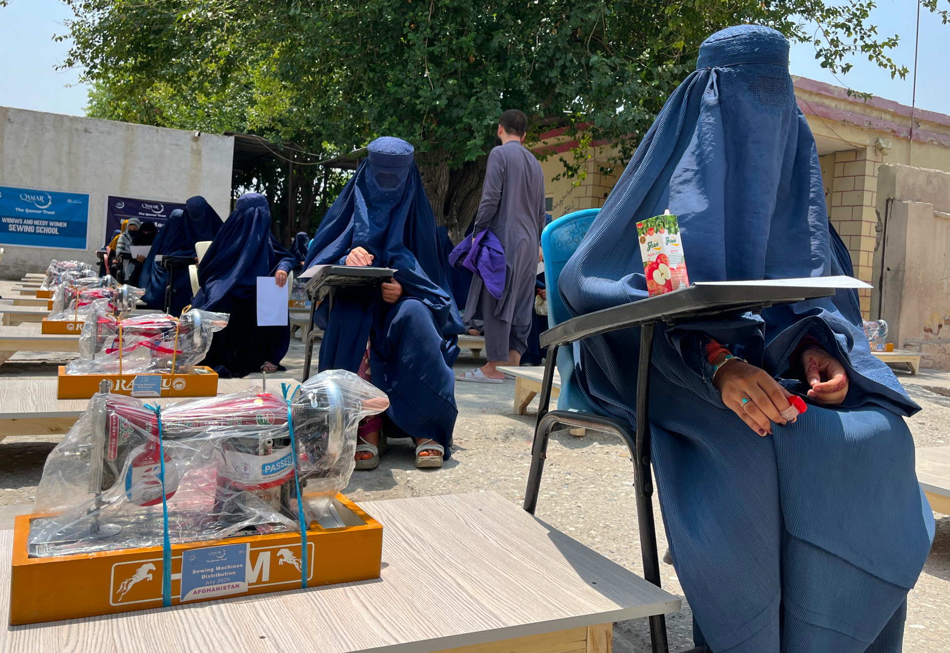 Women in Afghanistan with Sewing Machine | Human Relief Mission