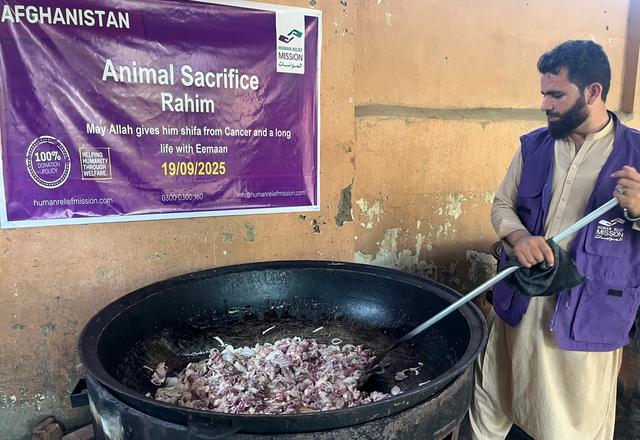 HRM Charity Aid Worker Preparing Hot Meals | Human Relief Mission