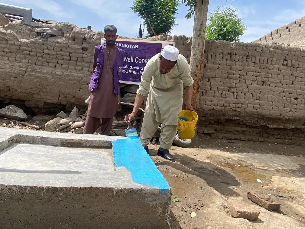 Water well in Afghanistan being built and painted | Human Relief Mission