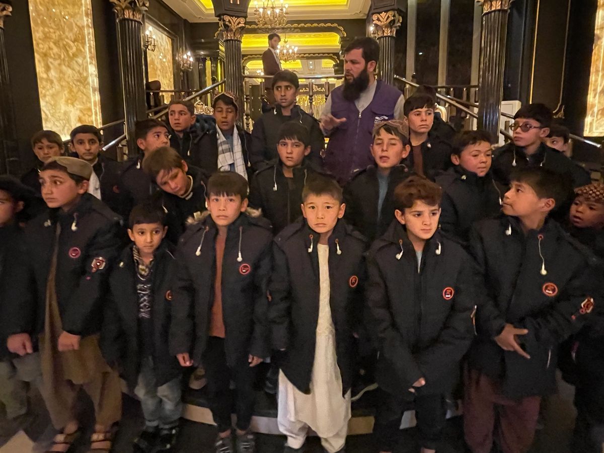HRM Charity Aid Worker with orphans on a day out | Human Relief Mission