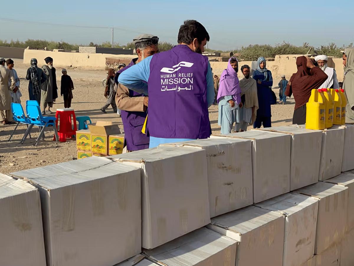 HRM Aid Workers preparing food packages in Afghanistan | Human Relief Mission