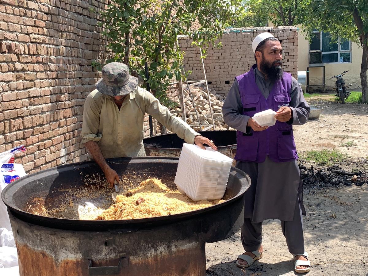HRM Aid Workers preparing hot meals | Human Relief Mission