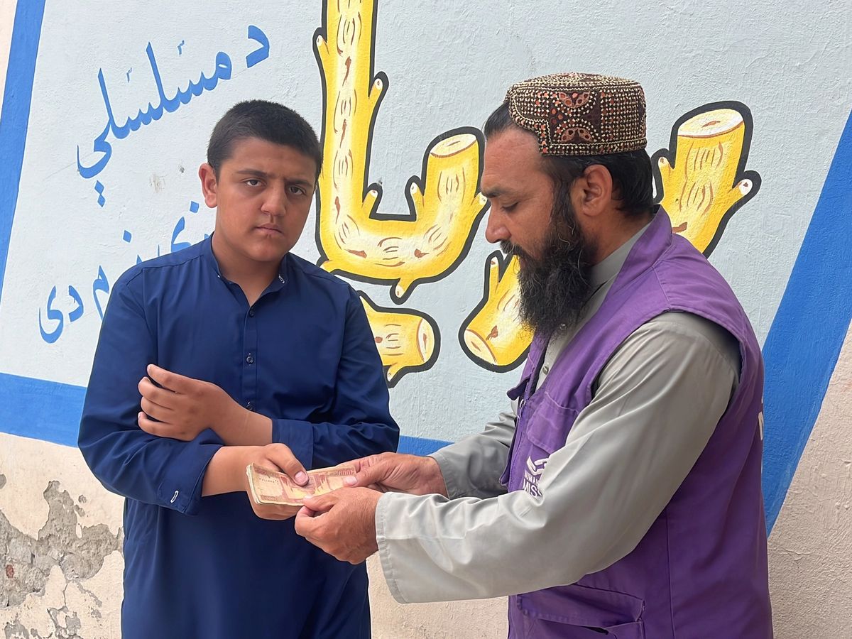 A Family in Afghanistan Receiving Cash | Human Relief Mission