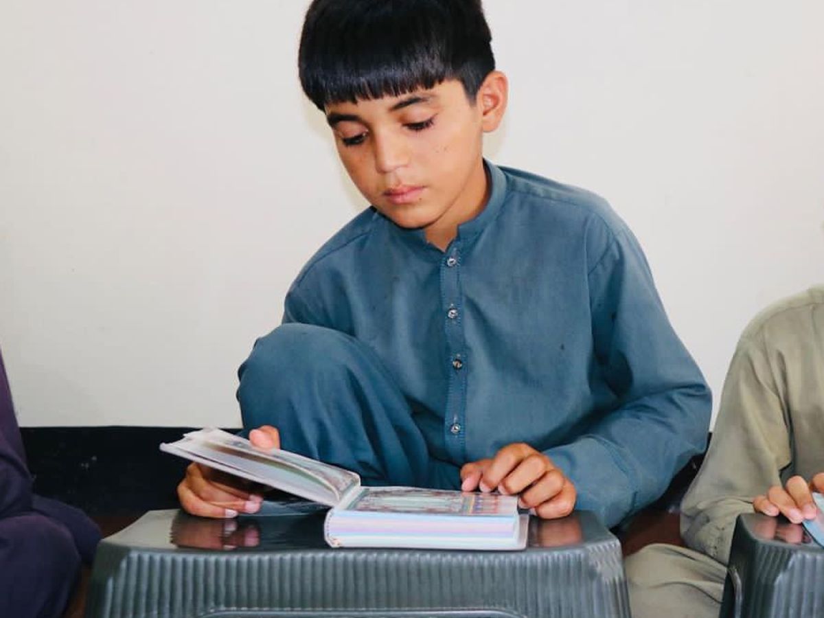 Students Reading in the Orphanage | Human Relief Mission