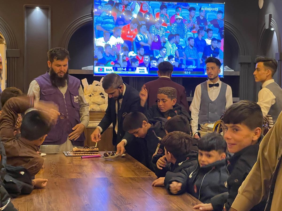 HRM Charity Aid Worker with orphans on a day out | Human Relief Mission