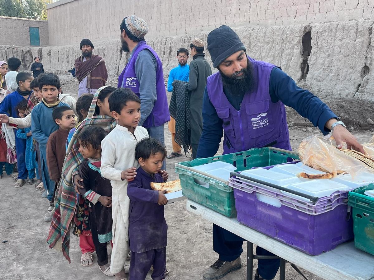 Children in Afghanistan receiving a hot meal | Human Relief Mission