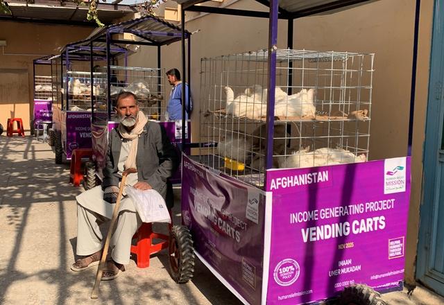 Afghan man with his IGP chicken cart | Human Relief Mission