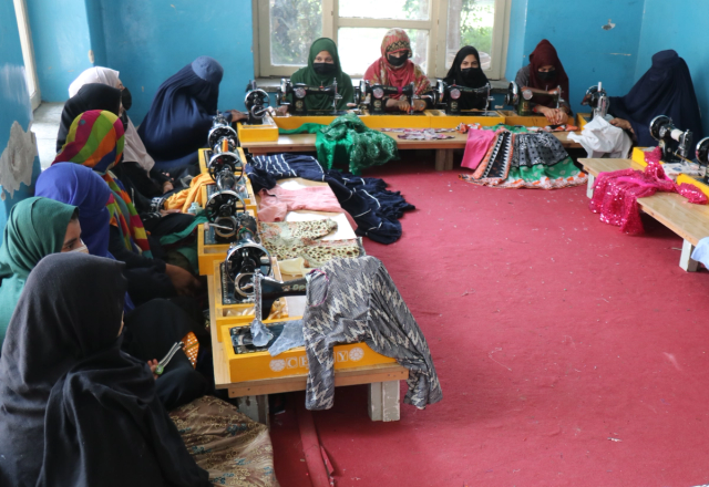 Women in Afghanistan with Sewing Machine Sewing Clothes | Human Relief Mission