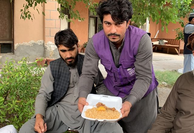 Hot Meals given to beneficiary in Afghanistan with HRM Charity aid Worker | Human Relief Mission