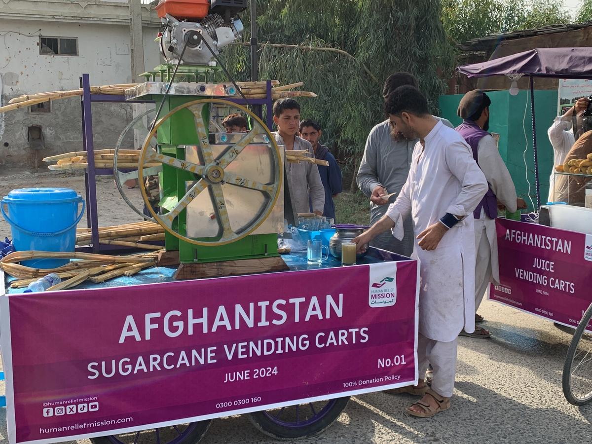 Men in Afghanistan providing Sugarcane juice from their Carts with Human Relief Mission Aid Workers | Human Relief Mission